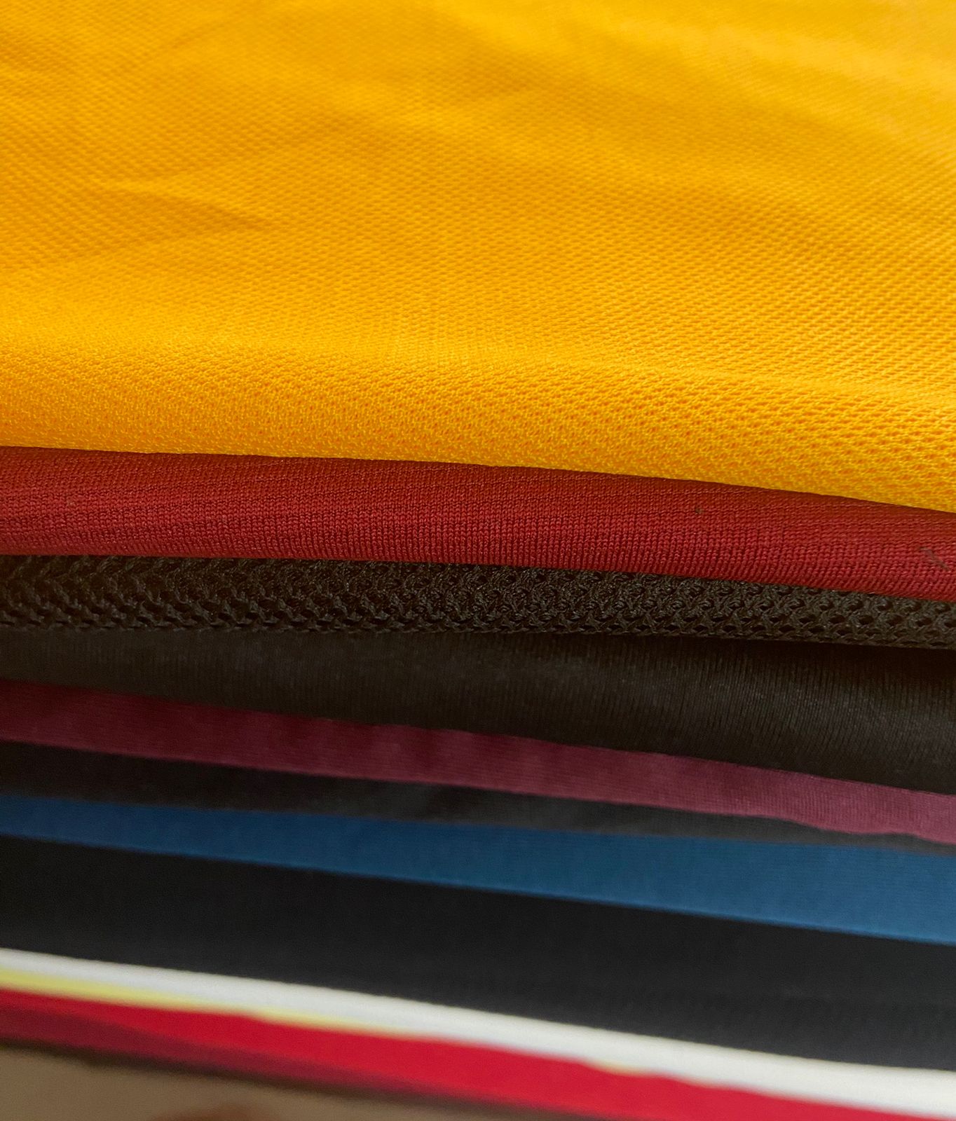 sportswear polyester knitted fabric manufacturers in delhi