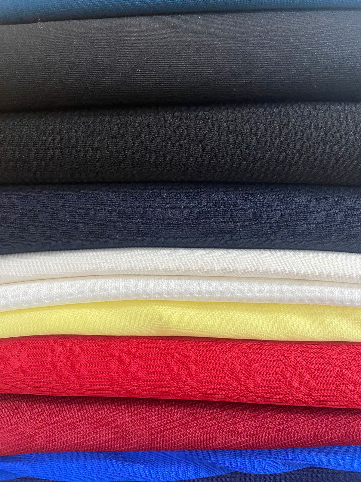 sportswear polyester knitted fabric manufacturers in delhi